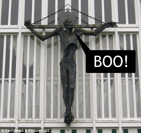 Weird crucifix, causing people to be "put off" going to church.